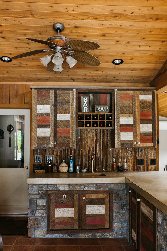 Mid-sized mountain style l-shaped ceramic tile and beige floor eat-in kitchen photo with an integrated sink, shaker cabinets, medium tone wood cabinets, brown backsplash, wood backsplash and a peninsula