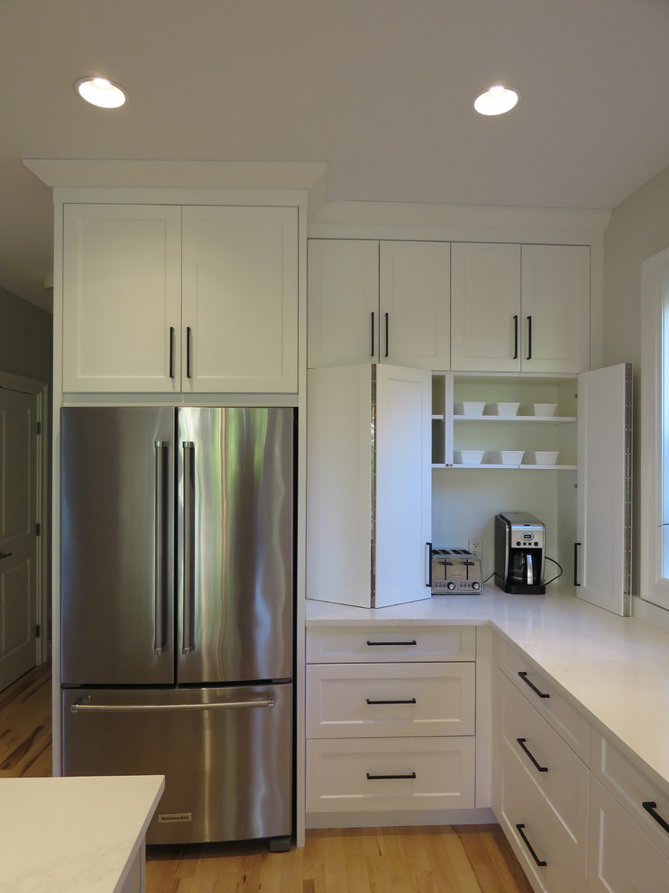 Example of a transitional kitchen design in Vancouver