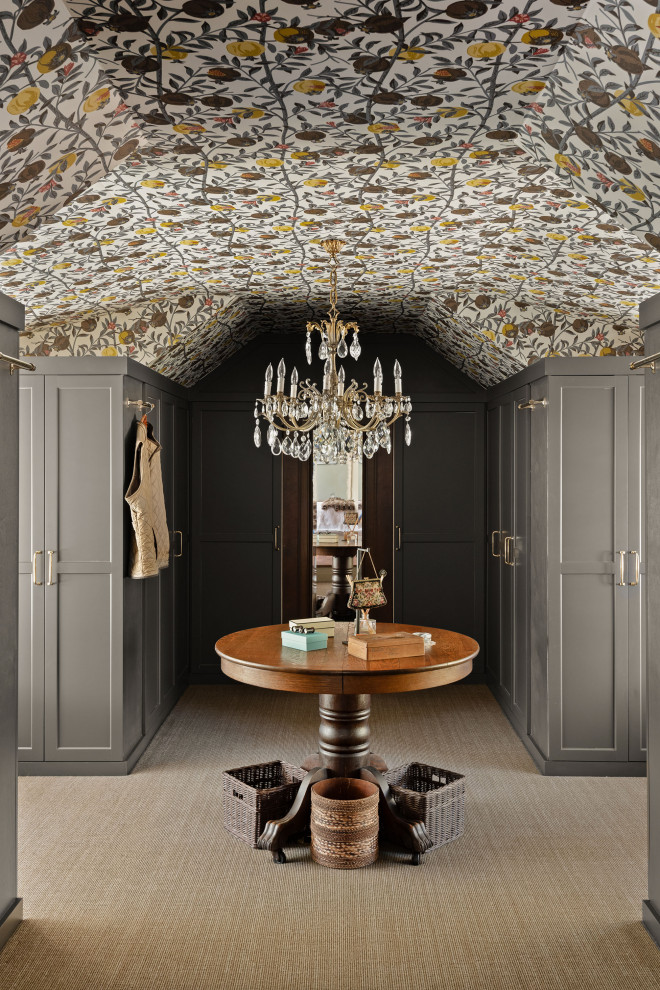 Inspiration for a timeless women's carpeted, beige floor and wallpaper ceiling walk-in closet remodel in Orlando with recessed-panel cabinets and gray cabinets