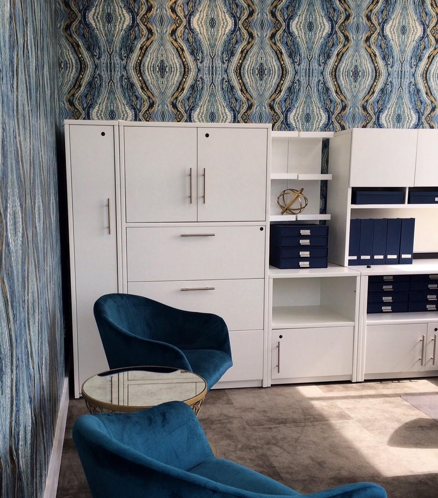 Mid-sized modern study room in DC Metro with blue walls, carpet and a freestanding desk.
