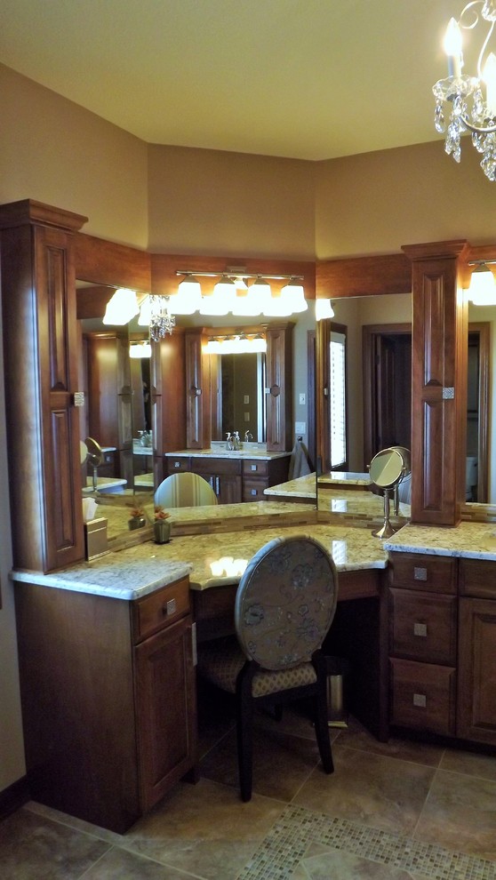Example of a transitional beige tile and porcelain tile porcelain tile doorless shower design with an undermount sink, raised-panel cabinets, medium tone wood cabinets, granite countertops and beige walls