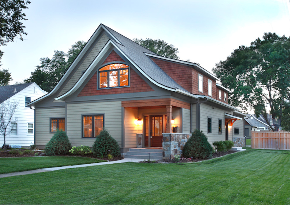 Inspiration for a mid-sized timeless brown two-story mixed siding exterior home remodel in Minneapolis