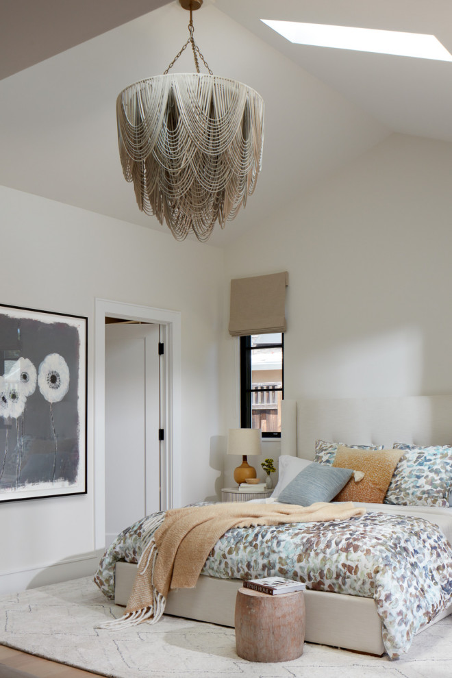 Bedroom - large transitional master light wood floor and vaulted ceiling bedroom idea in San Francisco