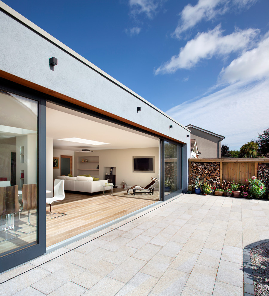 Inspiration for a large modern backyard patio in Dublin with no cover.