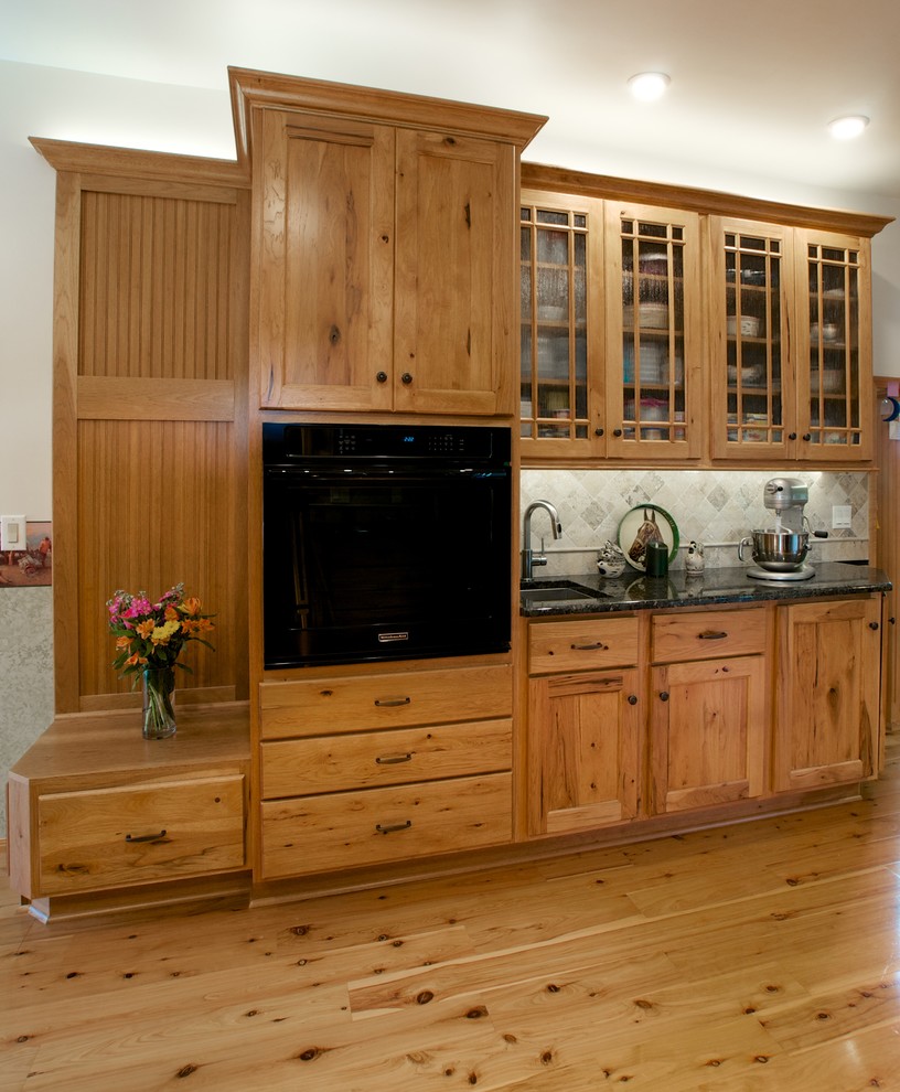 Eat-in kitchen - large rustic u-shaped eat-in kitchen idea in New York with light wood cabinets