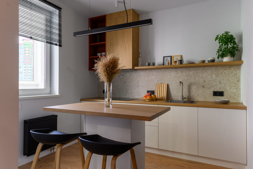This is an example of a small contemporary kitchen in Moscow.