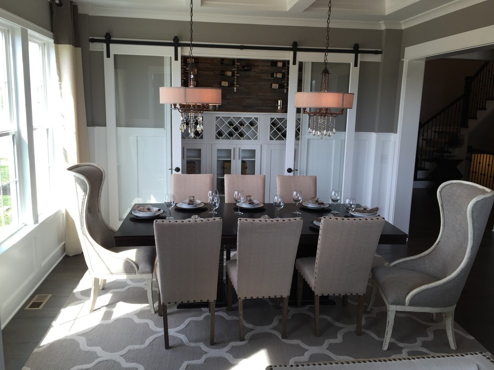 Inspiration for a modern medium tone wood floor dining room remodel in Indianapolis with beige walls and no fireplace