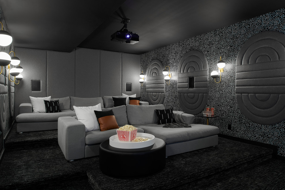 Foto di un ampio home theatre design con pareti bianche, pavimento in cemento e pavimento grigio