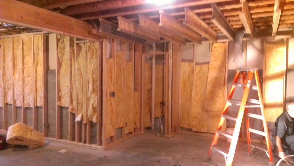 Example of a mid-sized walk-out basement design