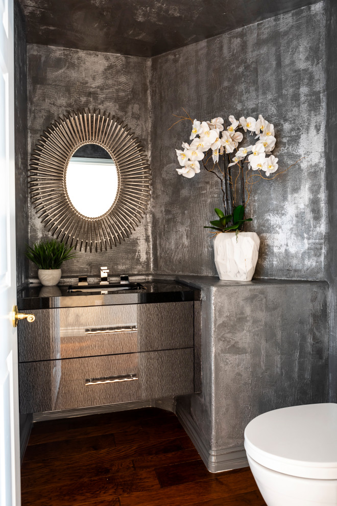 Photo of a transitional powder room in Other.