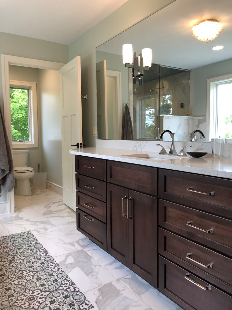 Photo of a large transitional master bathroom in Other with shaker cabinets, dark wood cabinets, a freestanding tub, a double shower, a two-piece toilet, white tile, marble, green walls, marble floors, an undermount sink, engineered quartz benchtops, white floor, a hinged shower door, white benchtops, an enclosed toilet, a single vanity and a built-in vanity.