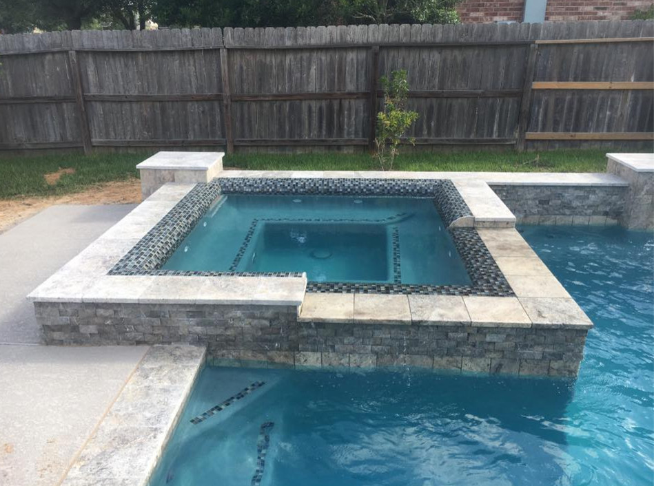 Mid-sized trendy backyard concrete and rectangular natural hot tub photo in Orange County