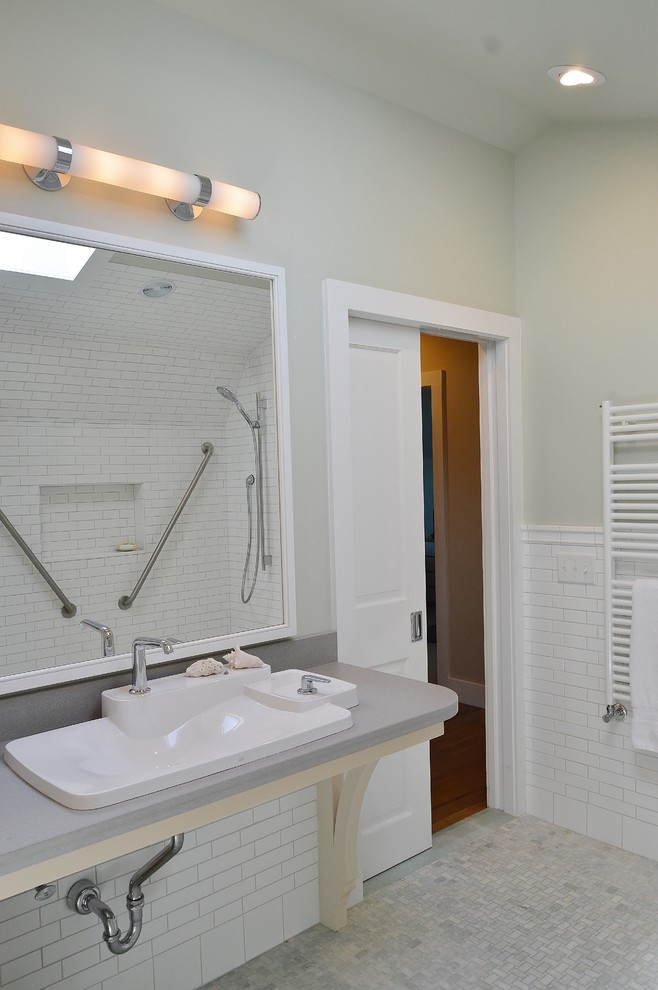 Inspiration for a large transitional master bathroom in Bridgeport with flat-panel cabinets, beige cabinets, an alcove shower, white tile, subway tile, green walls, mosaic tile floors and a drop-in sink.