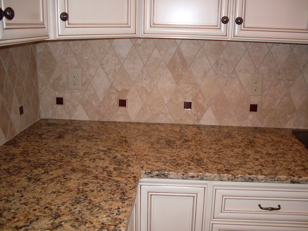 Open concept kitchen - mid-sized transitional u-shaped dark wood floor open concept kitchen idea in Cincinnati with an undermount sink, recessed-panel cabinets, white cabinets, granite countertops, beige backsplash, ceramic backsplash, stainless steel appliances and an island