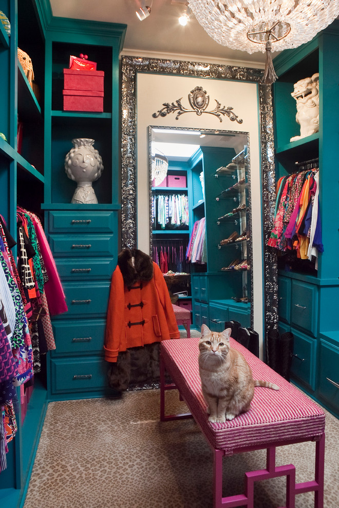 Inspiration for a small eclectic women's dressing room in Charleston with blue cabinets, raised-panel cabinets and carpet.