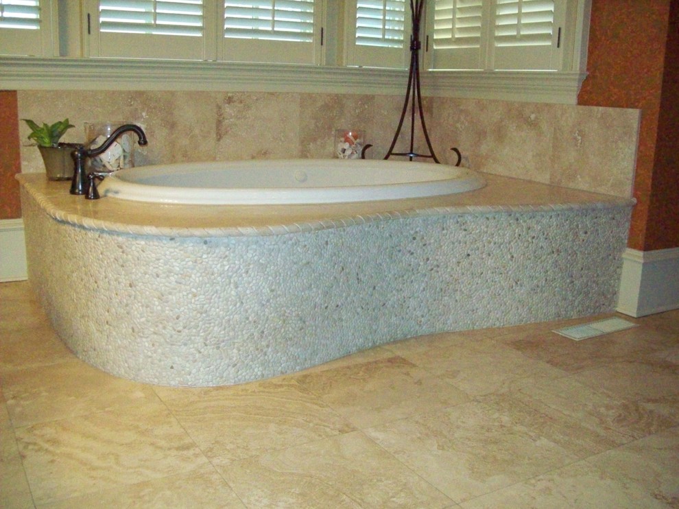 Example of a mountain style beige tile and stone tile travertine floor bathroom design in Atlanta