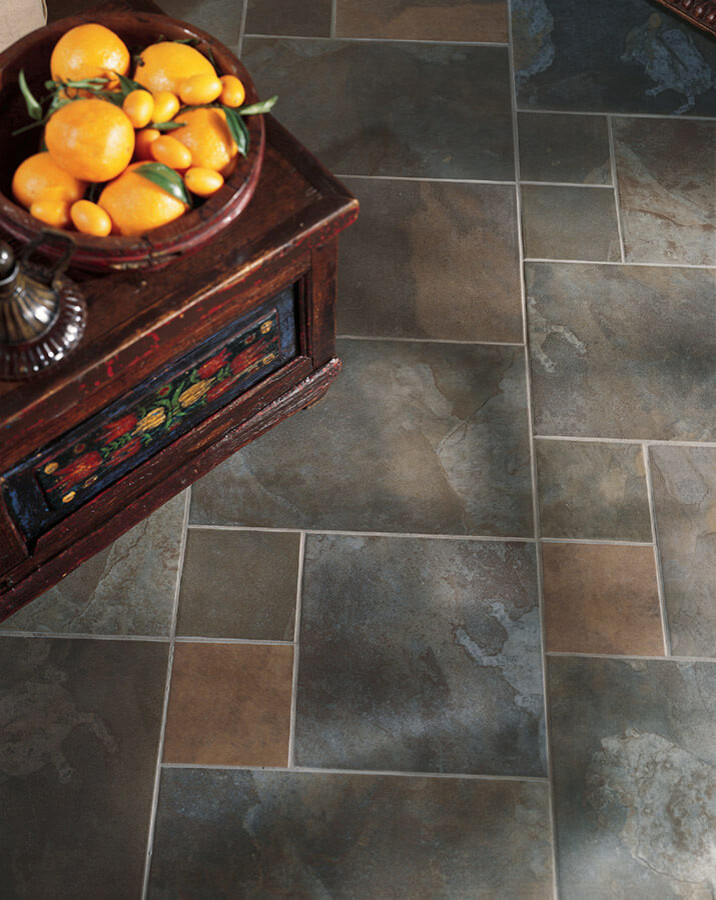 Inspiration for a rustic ceramic tile kitchen remodel in Indianapolis with shaker cabinets, distressed cabinets and wood countertops
