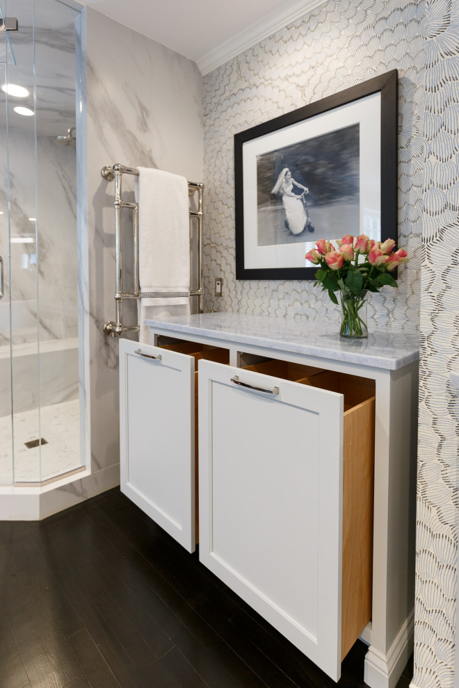This is an example of an expansive transitional master bathroom in New York with recessed-panel cabinets, grey cabinets, a freestanding tub, a double shower, marble benchtops, a hinged shower door, blue benchtops, a double vanity and a built-in vanity.