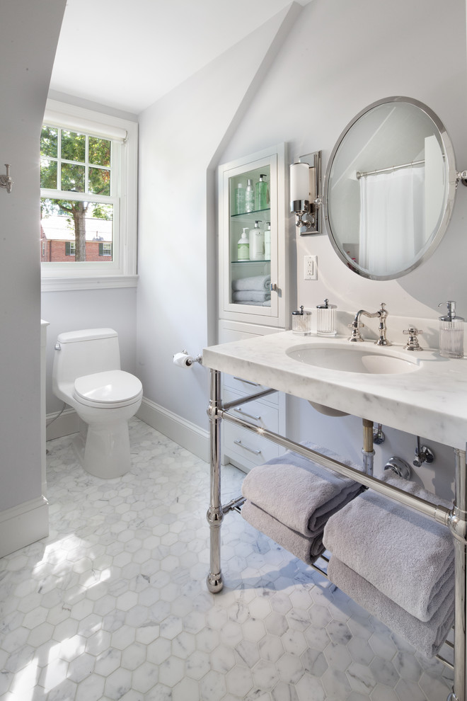 Inspiration for a transitional bathroom remodel in DC Metro with an undermount sink, open cabinets and marble countertops