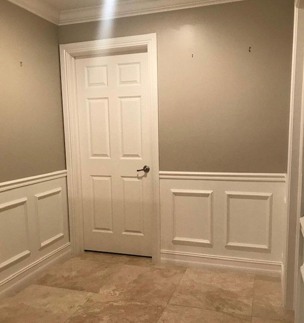 Example of a small transitional hallway design in Miami