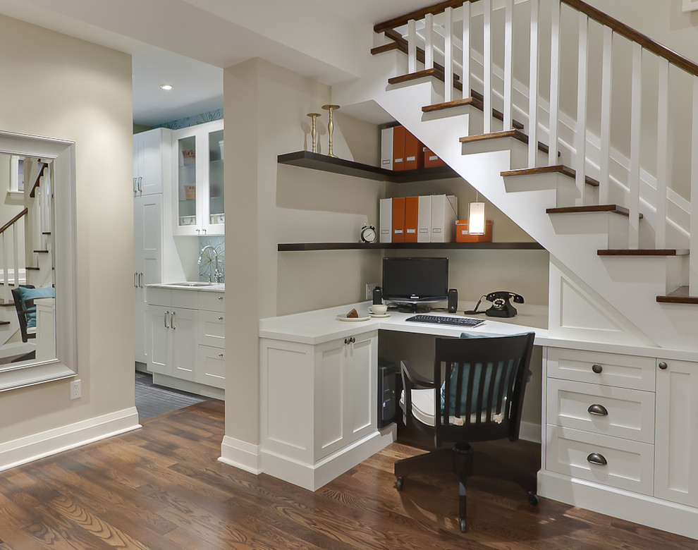 Traditional home office in Toronto with a built-in desk.