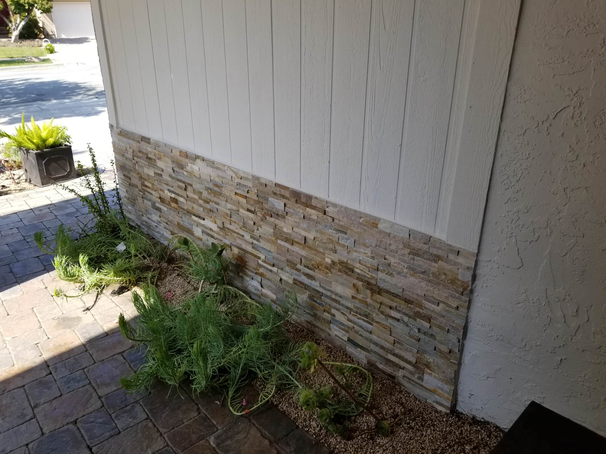 Exterior Painting and stone Installation