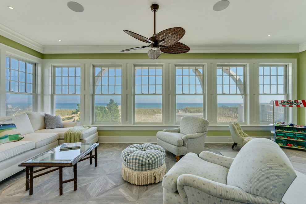 Inspiration for a mid-sized beach style sunroom in New York with ceramic floors, a standard ceiling and grey floor.
