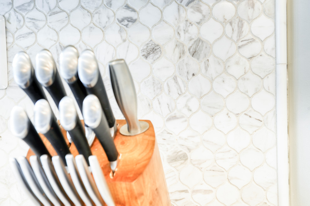Inspiration for a huge transitional galley light wood floor and brown floor eat-in kitchen remodel in DC Metro with an undermount sink, beaded inset cabinets, white cabinets, quartzite countertops, white backsplash, marble backsplash, stainless steel appliances, an island and white countertops