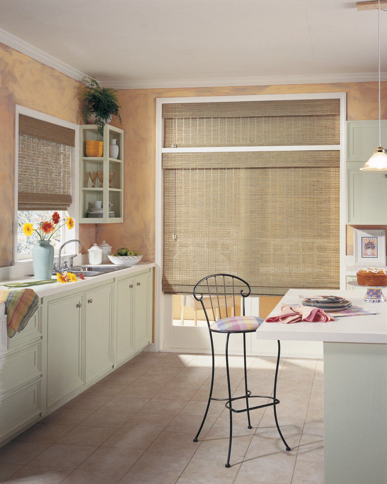 Open concept kitchen - mid-sized transitional u-shaped ceramic tile and beige floor open concept kitchen idea in Edmonton with a double-bowl sink, recessed-panel cabinets, white cabinets, solid surface countertops, stainless steel appliances and an island