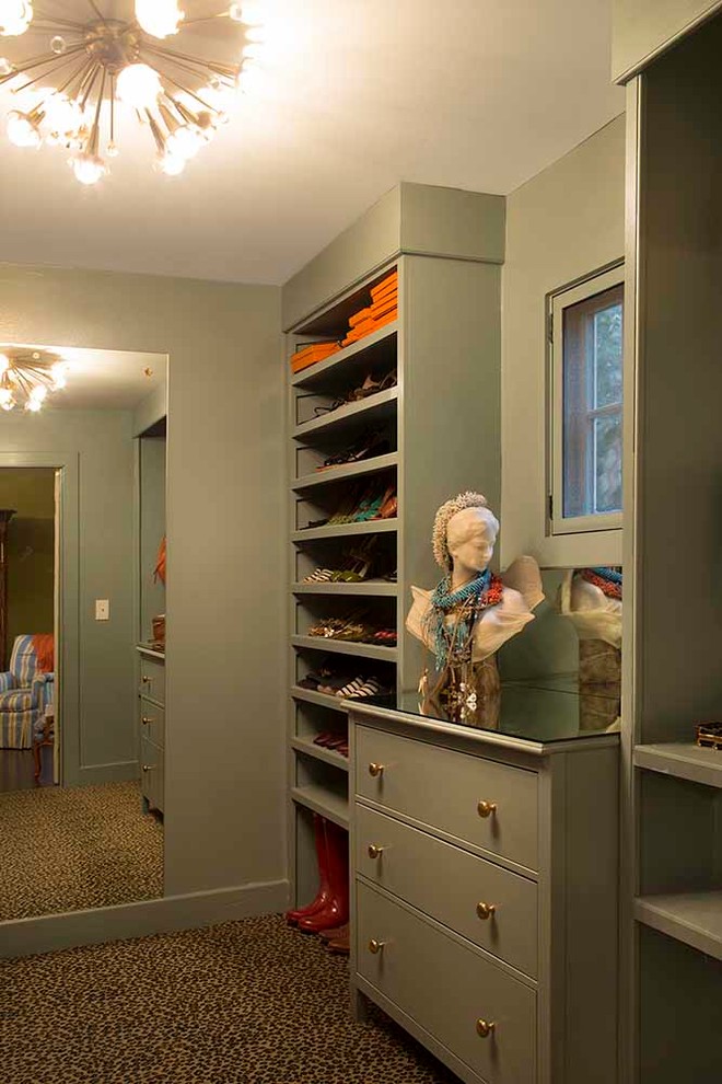 Inspiration for a large traditional walk-in wardrobe in Other with flat-panel cabinets, green cabinets and carpet.
