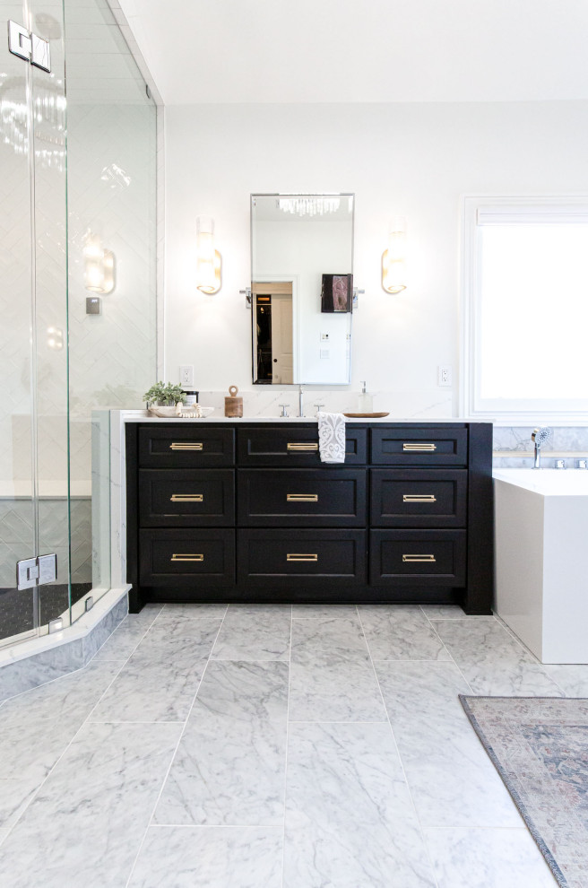 Inspiration for a large contemporary master bathroom in Atlanta with shaker cabinets, black cabinets, a freestanding tub, a one-piece toilet, white tile, glass tile, white walls, marble floors, an undermount sink, engineered quartz benchtops, multi-coloured floor, a hinged shower door, white benchtops, a niche, a single vanity, a freestanding vanity and vaulted.