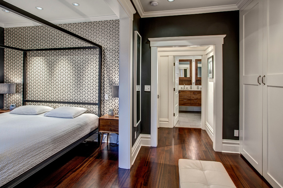 Photo of a transitional master bedroom in Seattle with multi-coloured walls and dark hardwood floors.
