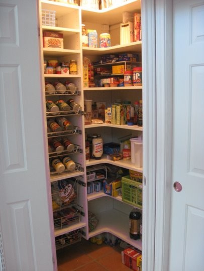 Transitional kitchen pantry photo in Austin