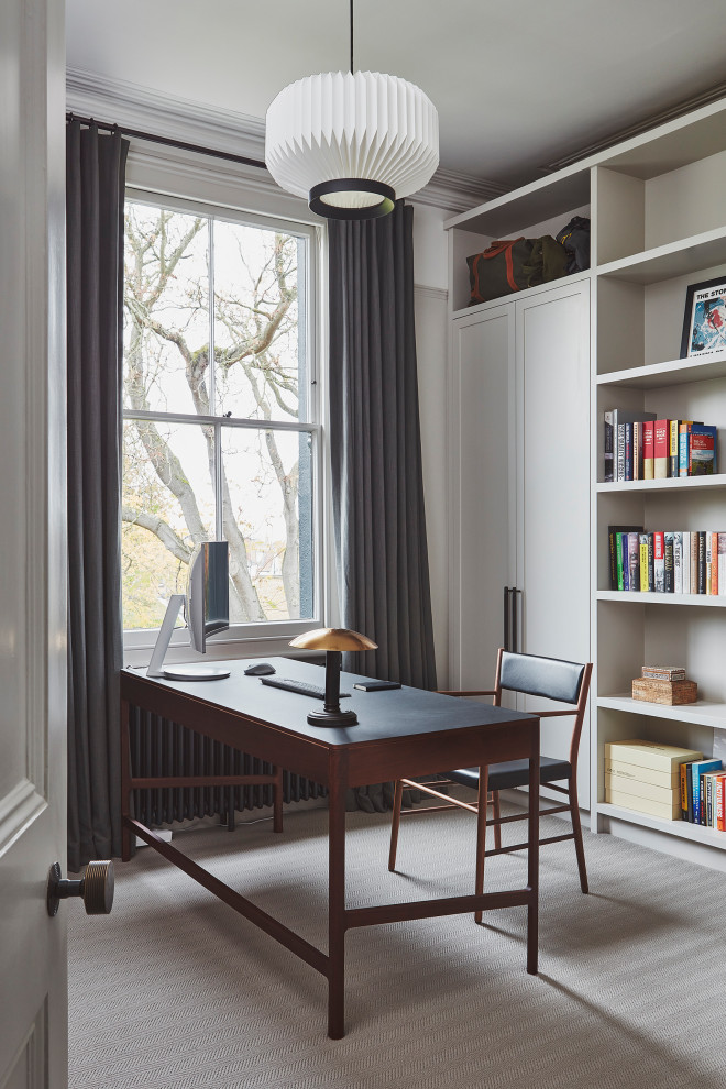 Design ideas for a contemporary home office in London.