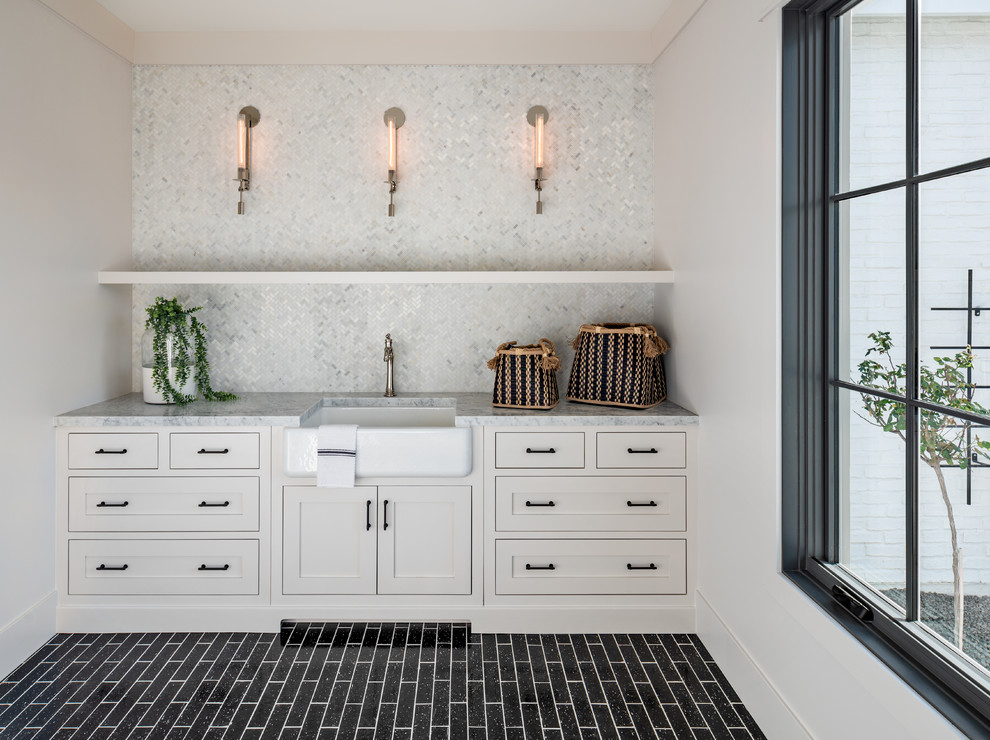 Example of a transitional laundry room design in Phoenix