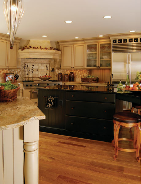 Inspiration for a large transitional medium tone wood floor eat-in kitchen remodel in Indianapolis with multicolored backsplash, stainless steel appliances, an island and light wood cabinets