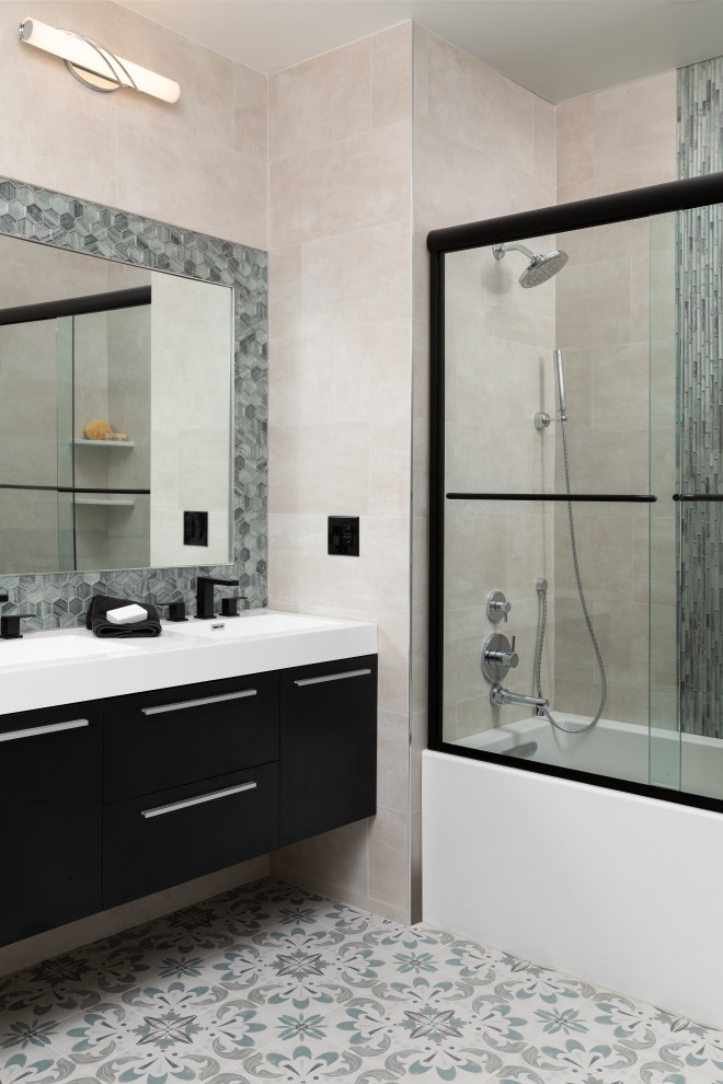 Bathroom - mid-sized mid-century modern beige tile and glass tile porcelain tile, turquoise floor and double-sink bathroom idea in Newark with flat-panel cabinets, black cabinets, a one-piece toilet, beige walls, an integrated sink, solid surface countertops, white countertops and a floating vanity
