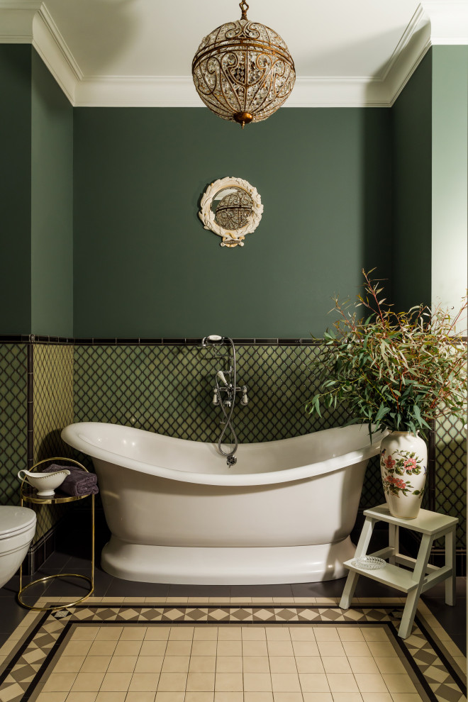 Design ideas for a transitional master bathroom in Other with a freestanding tub, green tile and green walls.