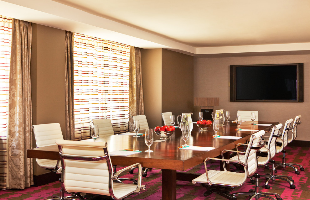 Inspiration for a large transitional carpeted enclosed dining room remodel in Dallas with brown walls and no fireplace