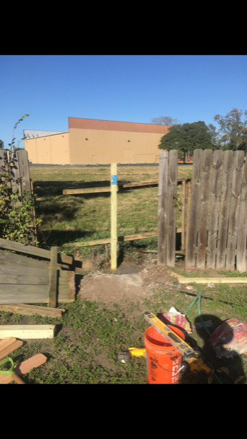 Reinforced Repaired Wood Fence