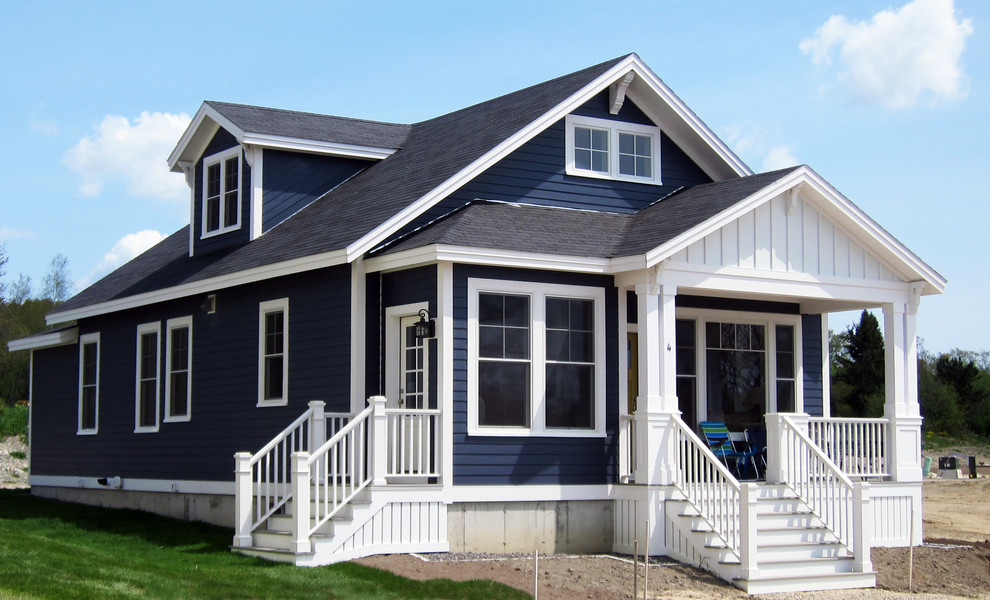This is an example of a mid-sized arts and crafts home design in Portland Maine.