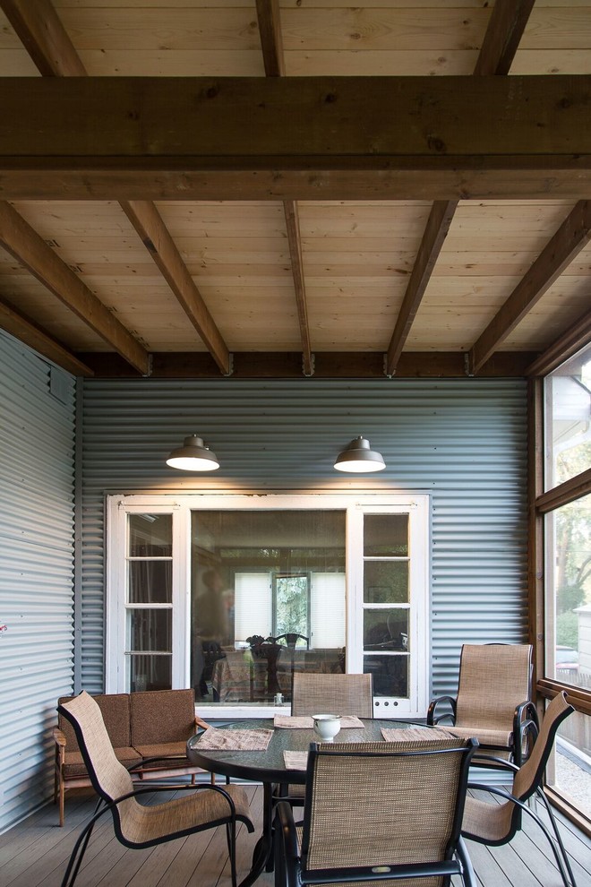 Deck - mid-sized transitional backyard deck idea with a roof extension
