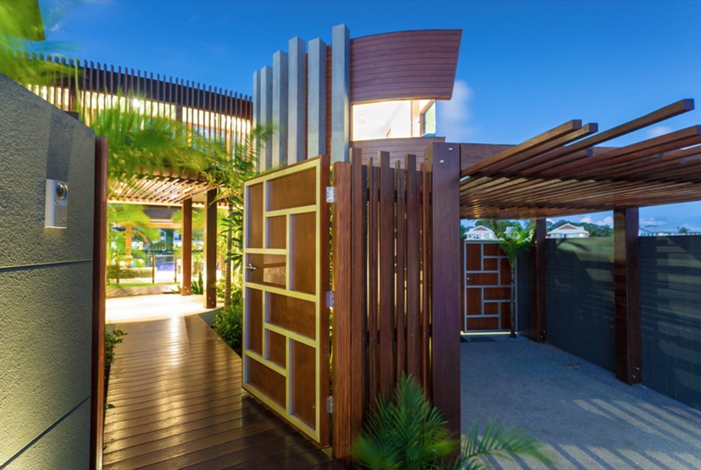 Design ideas for a tropical garden in Sunshine Coast.