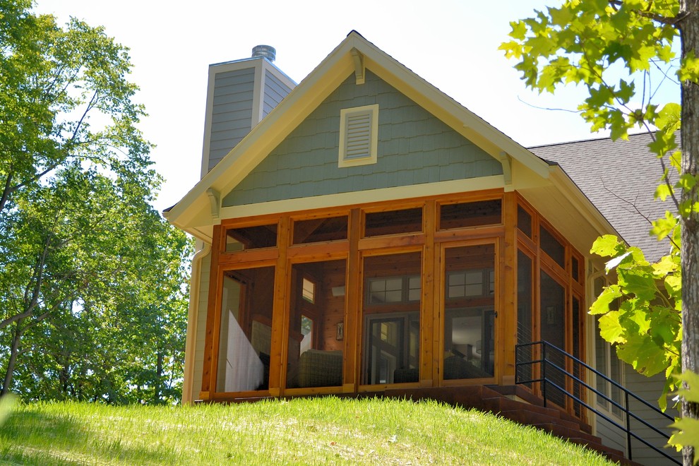Example of a large mountain style home design design in Milwaukee