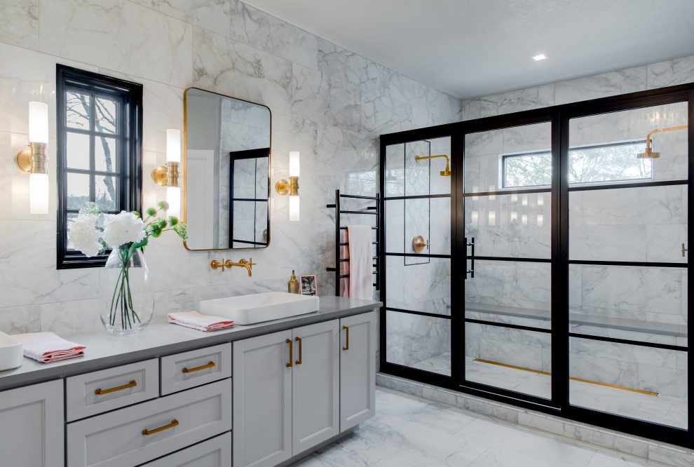 Inspiration for a transitional bathroom in Austin with shaker cabinets, white cabinets, a double shower, gray tile, a vessel sink, grey floor, a hinged shower door, grey benchtops, a shower seat, a double vanity and a built-in vanity.