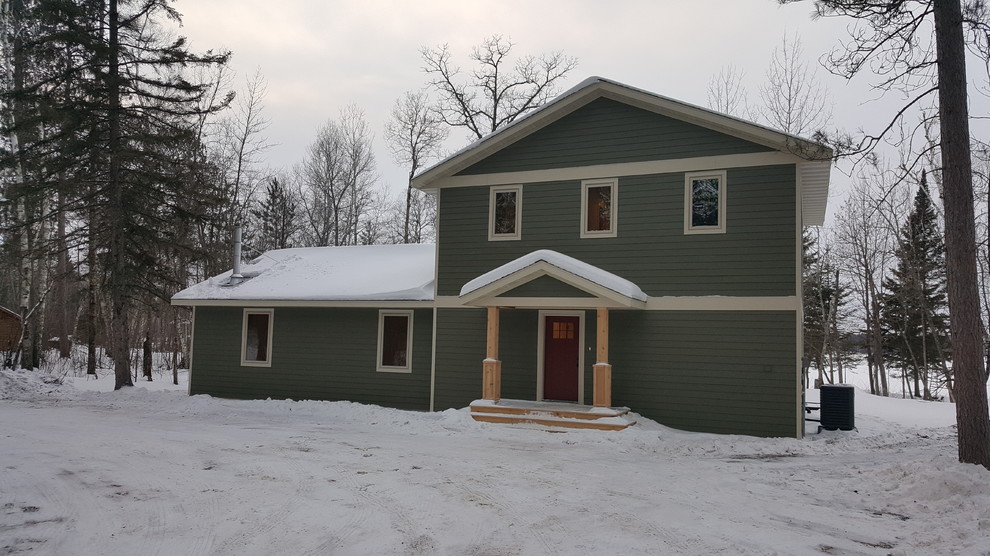 Mountain style concrete fiberboard multicolored home design photo in Minneapolis
