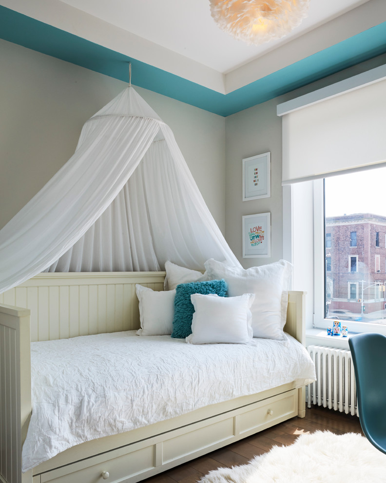 Inspiration for a mid-sized contemporary girl dark wood floor kids' room remodel in New York with multicolored walls