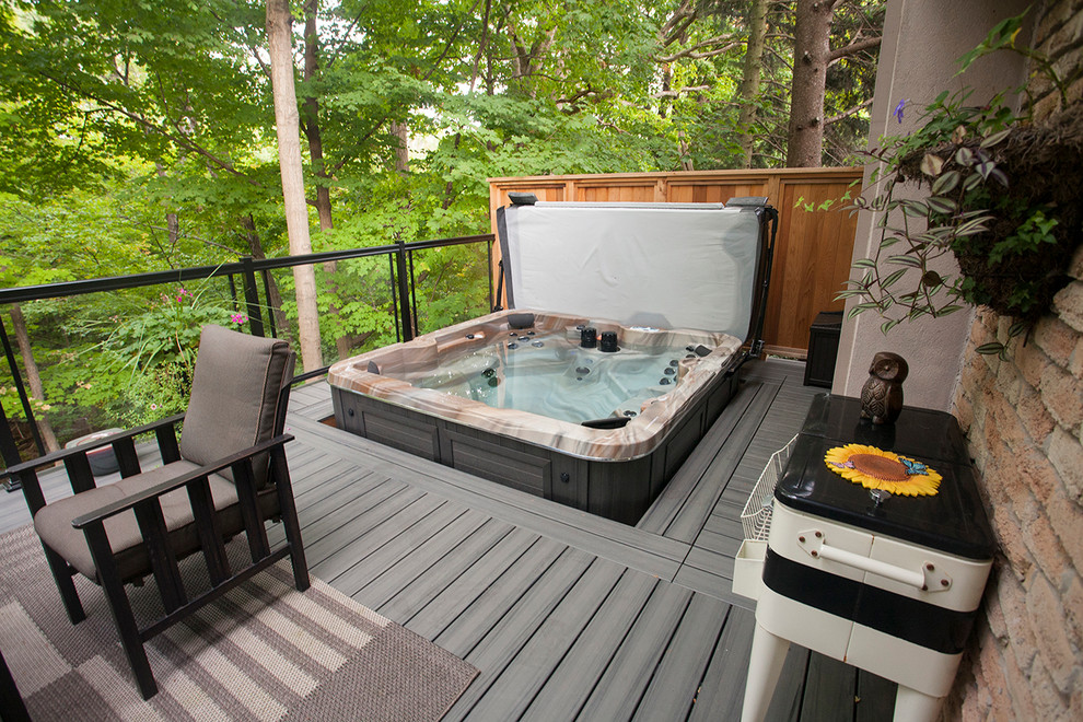 Deck - contemporary backyard deck idea in Toronto with no cover