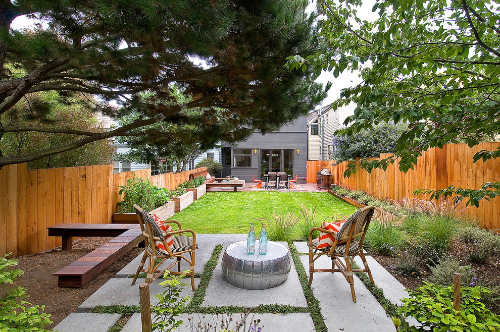 Example of a trendy backyard concrete paver patio design in San Francisco