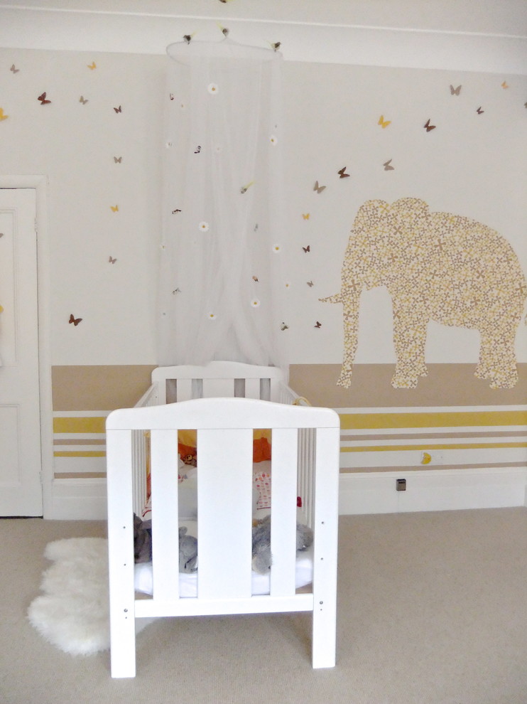 Inspiration for a large eclectic gender-neutral nursery in London with carpet.